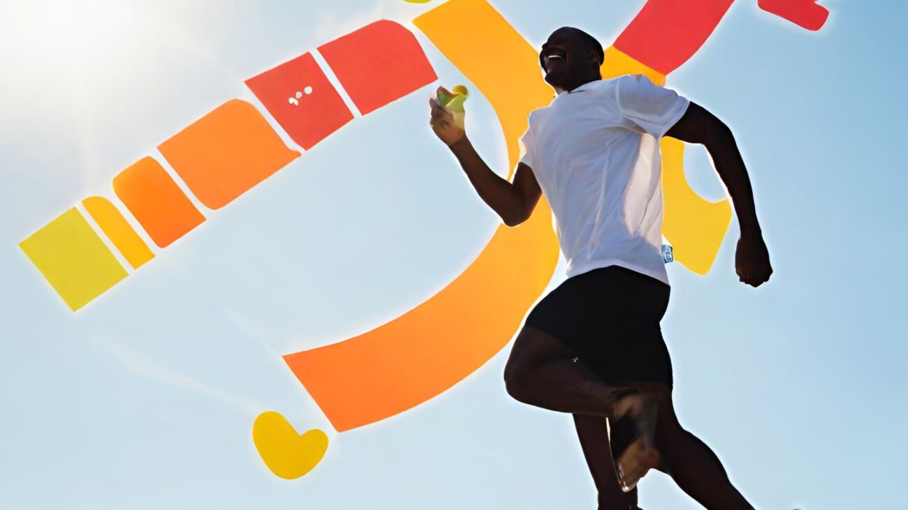 Ilustracja przedstawiająca radosnego biegacza na tle nieba. Symbol 'M' z magnesem symbolizuje harmonię metabolizmu, zdrowego jedzenia i aktywności fizycznej